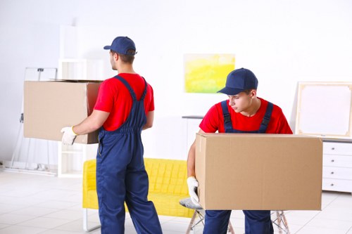Professional removal team planning a move in a Mayfair street