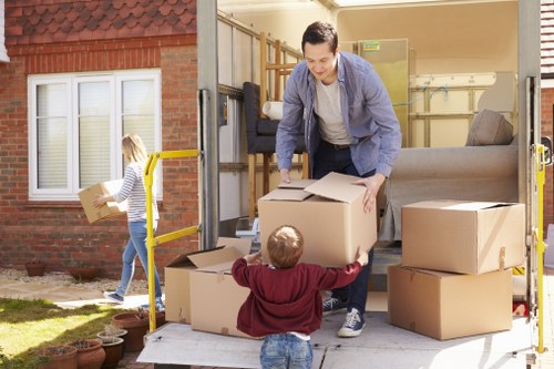 Removal team loading a property move with attention to access restrictions