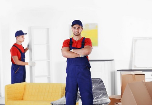 House movers preparing a move in a Mayfair townhouse street