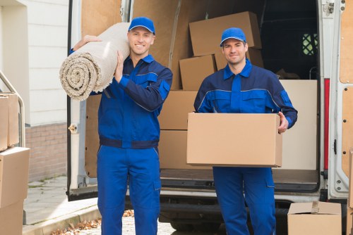Local movers preparing furniture and boxes for transport in Mayfair