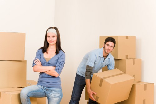 Removalists carefully loading items for a house move in Mayfair