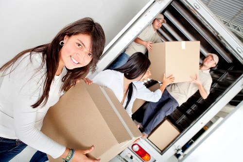 Packing and labeling household items for a Mayfair move