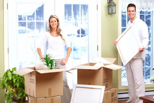 Packed office boxes and equipment ready for relocation in Mayfair